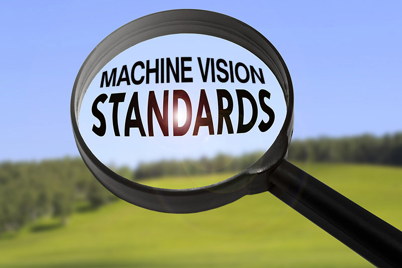 The words “machine vision standards” under a magnifying glass