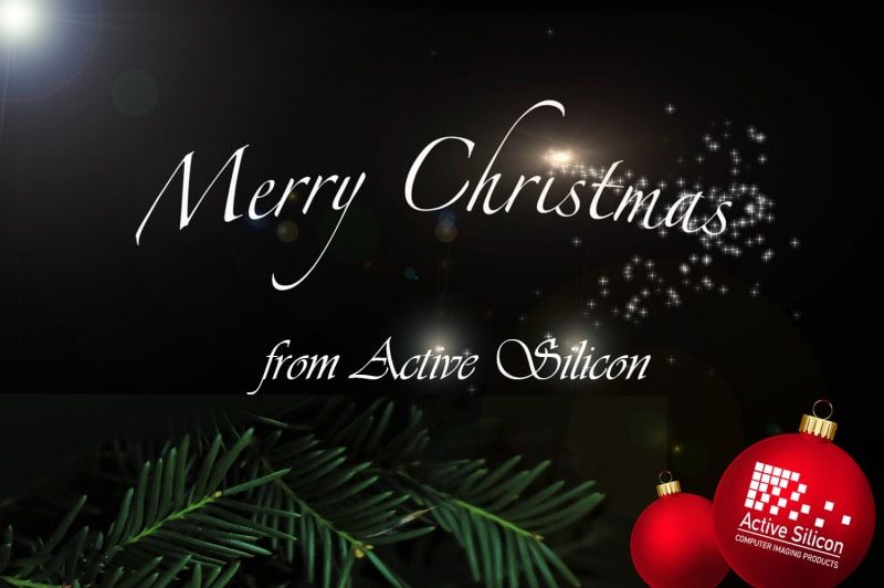 Merry Christmas message with festive baubles