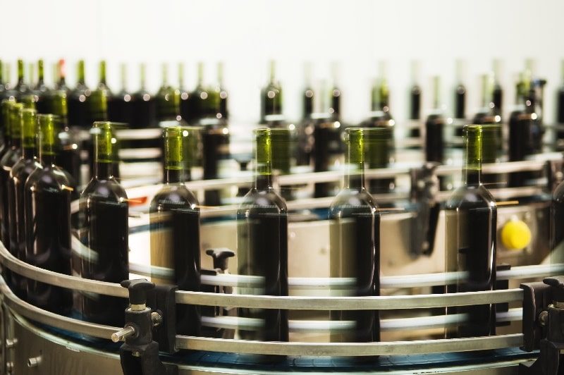 Fast-moving bottles on a production line