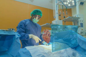 A surgeon operating with an augmented image of a heart floating above the patient