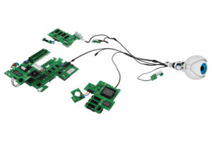 A prosthetic eye attached to several circuit boards