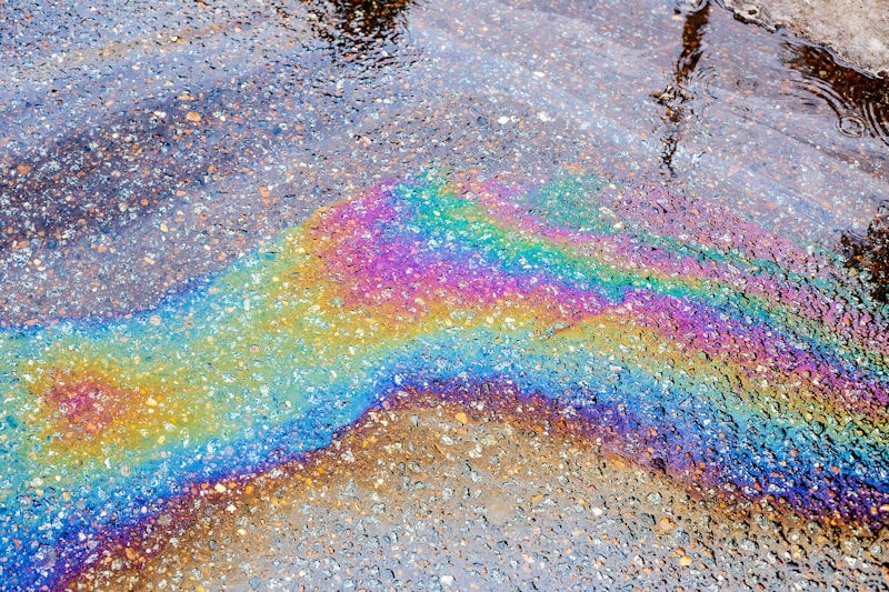 oil floating on water making a rainbow effect