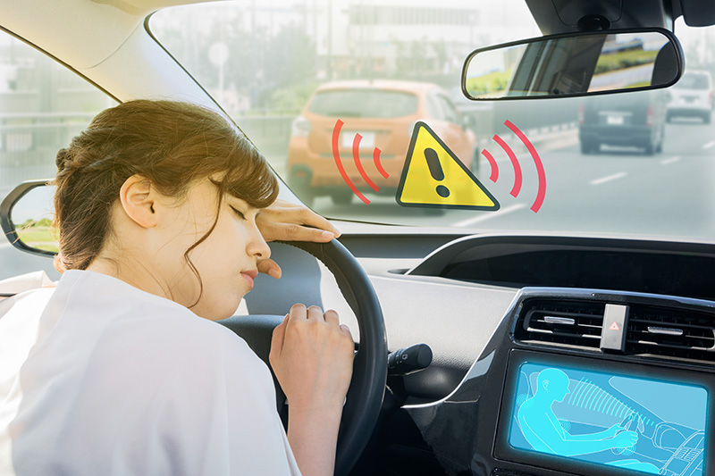 Affective computing in cars - system alarms a lady nodding off whilst driving