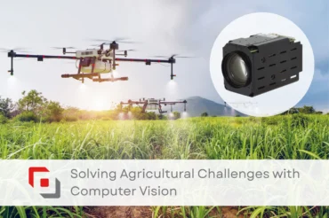 A drone spraying in a field and a block camera